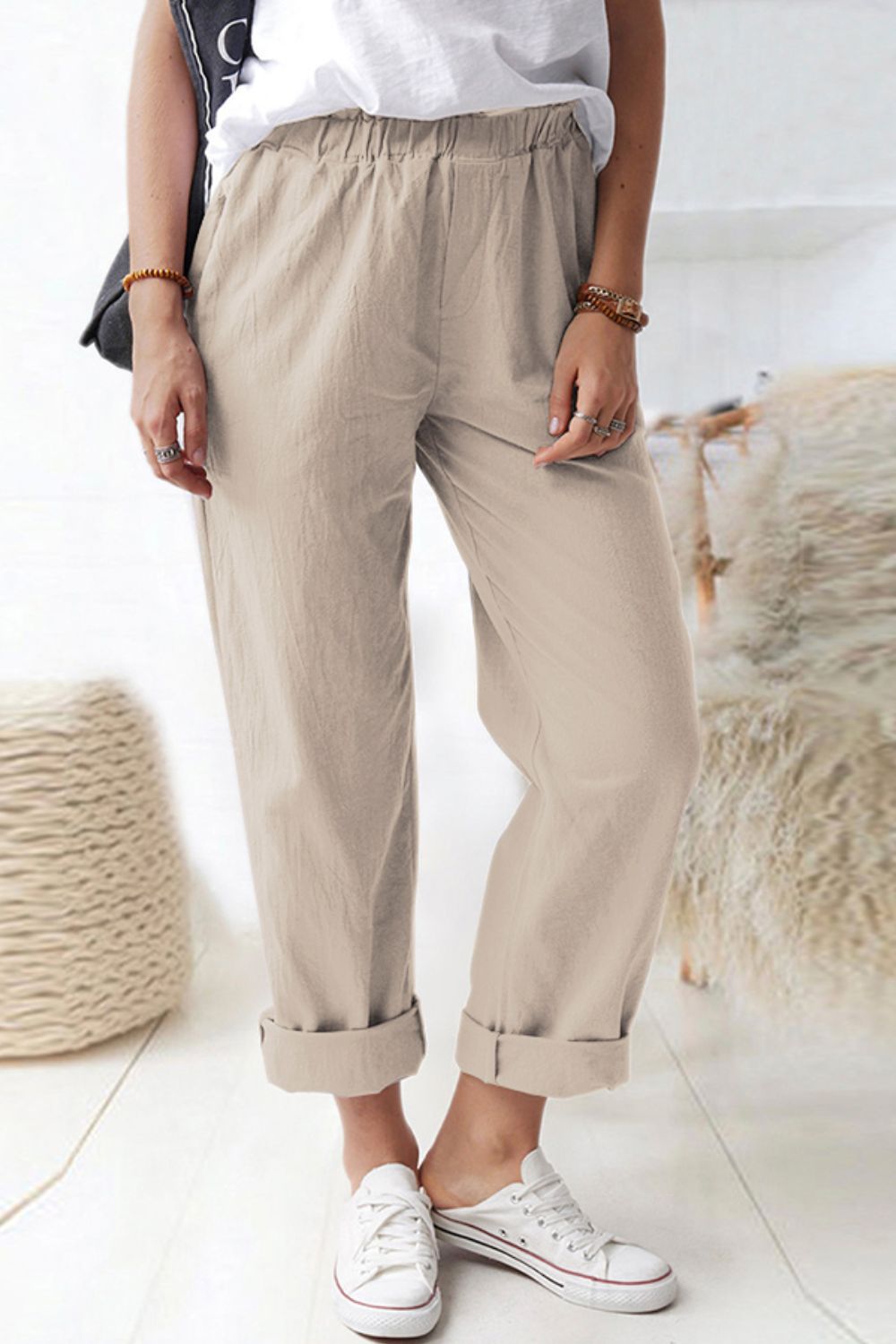 Pantalones con cintura paperbag brillante y bolsillos