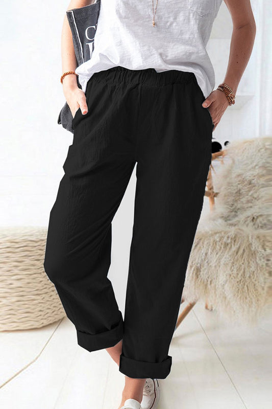 Pantalones con cintura paperbag brillante y bolsillos