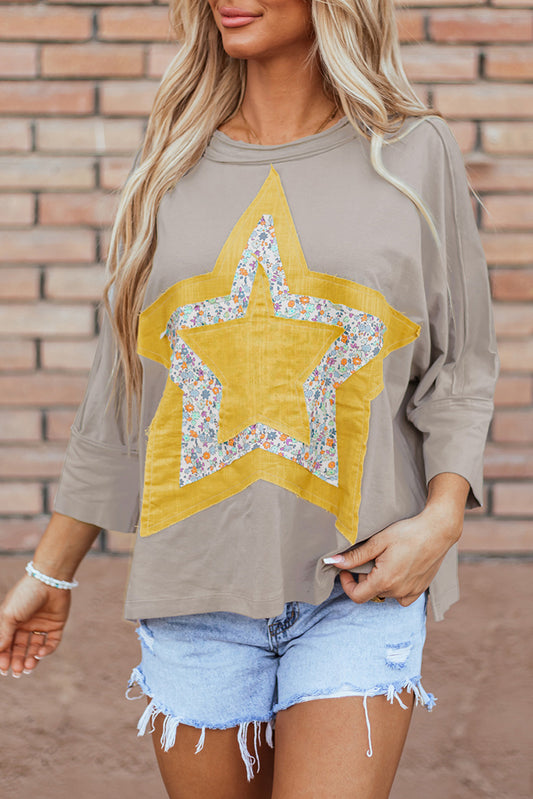 Camiseta de cuello redondo con apliques de estrellas