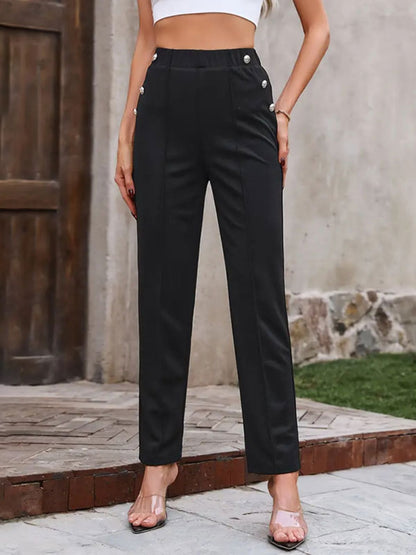 Pantalones con cintura elástica y botones decorativos