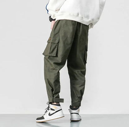 Pantalones harén de algodón con múltiples bolsillos y cintura elástica para hombre, pantalones casuales de estilo punk callejero y hip hop, pantalones de chándal estilo militar para hombre