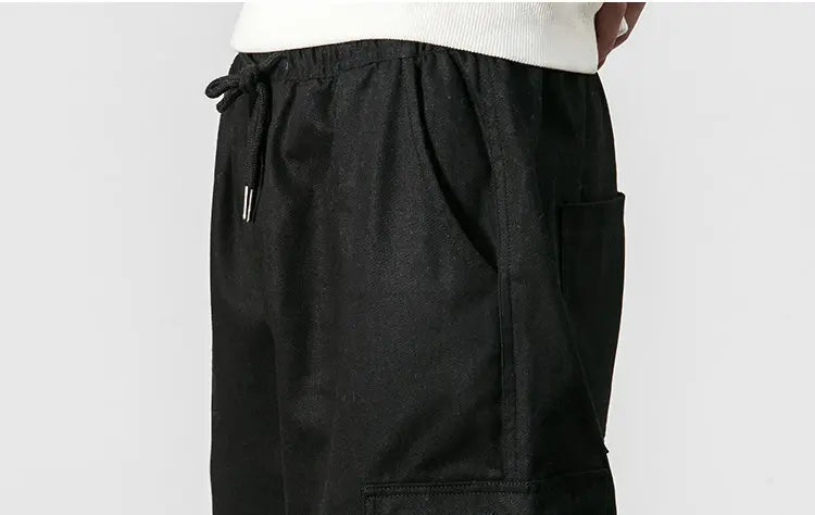 Pantalones harén de algodón con múltiples bolsillos y cintura elástica para hombre, pantalones casuales de estilo punk callejero y hip hop, pantalones de chándal estilo militar para hombre