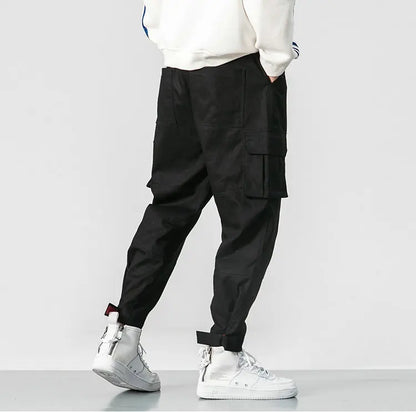 Pantalones harén de algodón con múltiples bolsillos y cintura elástica para hombre, pantalones casuales de estilo punk callejero y hip hop, pantalones de chándal estilo militar para hombre