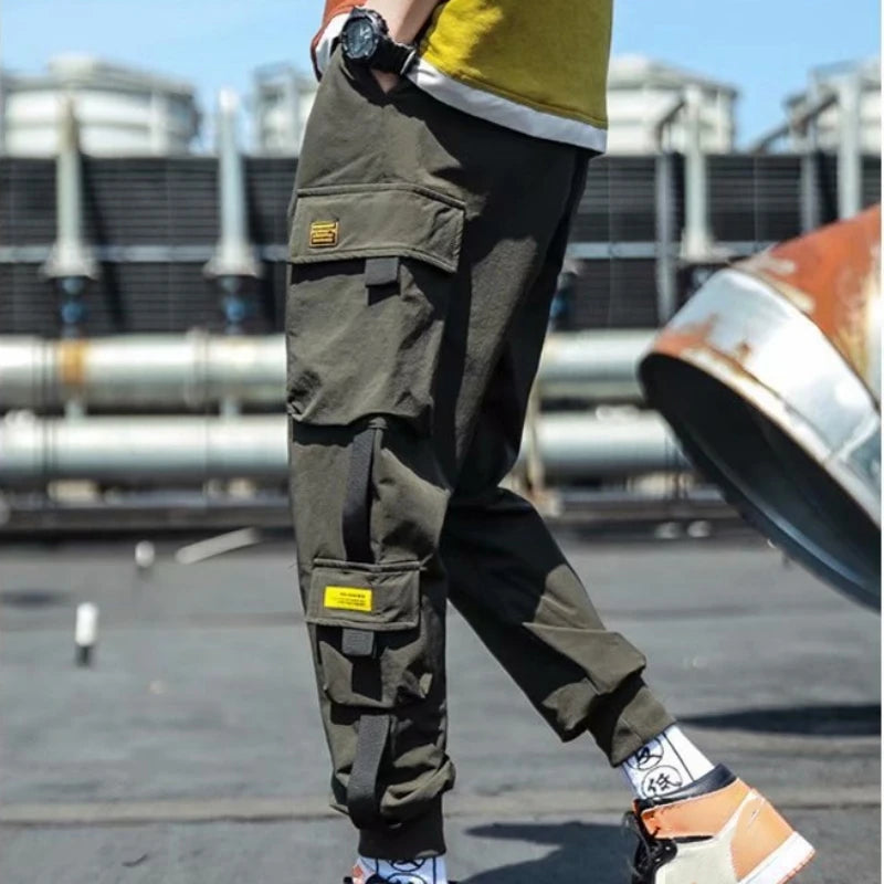 Pantalones cargo de estilo hip hop para hombre, pantalón harén, con múltiples bolsillos y cintas, ropa de calle, informal, tallas M a 6XL