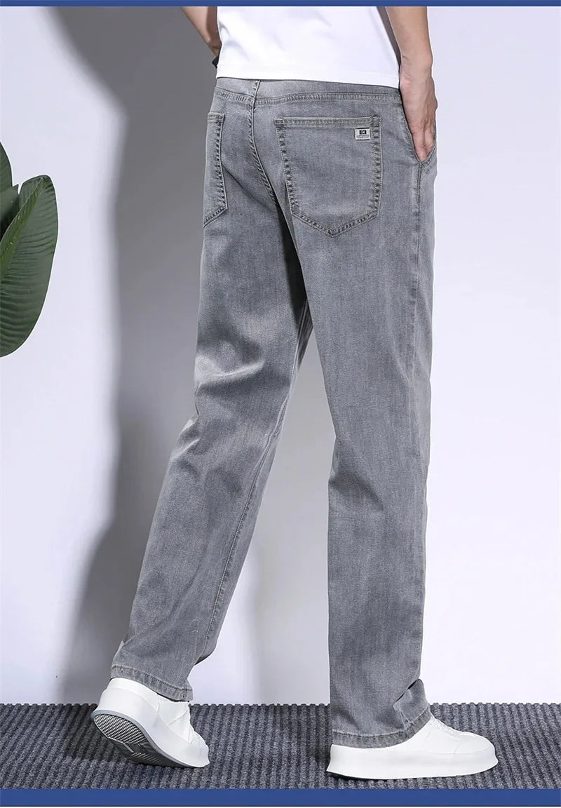 Pantalones vaqueros de verano para hombre, de tejido lyocell suave, finos, sueltos, rectos, con cordón y cintura elástica, informales, de Corea, talla grande 28-42