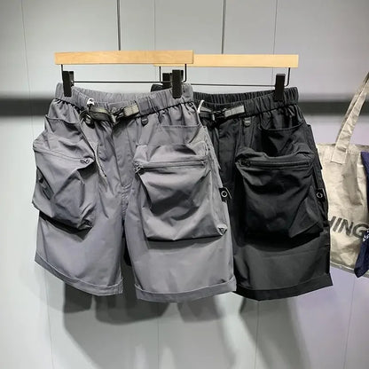 Pantalones cortos de verano para hombre, estilo coreano, de color negro, con cintura alta, de gran tamaño, con múltiples bolsillos y carga, para entrenamiento físico