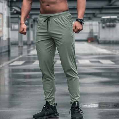 Pantalones deportivos para hombre con bolsillos, pantalones de entrenamiento para correr, pantalones deportivos de secado rápido, pantalones deportivos de alta calidad