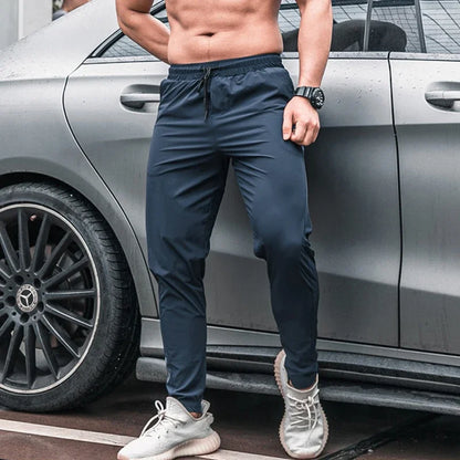 Pantalones deportivos para hombre con bolsillos, pantalones de entrenamiento para correr, pantalones deportivos de secado rápido, pantalones deportivos de alta calidad