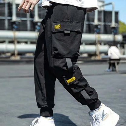 Pantalones cargo de estilo hip hop para hombre, pantalón harén, con múltiples bolsillos y cintas, ropa de calle, informal, tallas M a 6XL