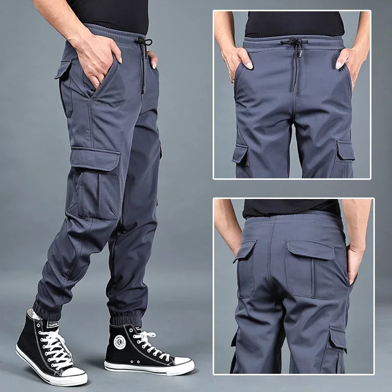 Pantalones de invierno para hombre, de forro polar grueso, para correr, con múltiples bolsillos, holgados, informales, cálidos, cargo, tallas M a 6XL