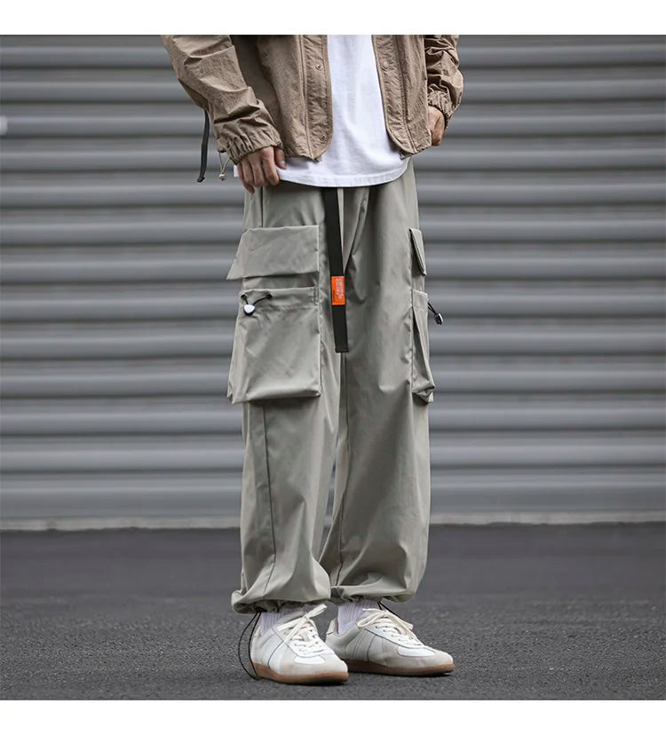 UETEEY Oversize Streetwear Drawstring Leggings Parachute Men Cargo Pants Loose Big Pocket Military Tactical Male Casual Trouser