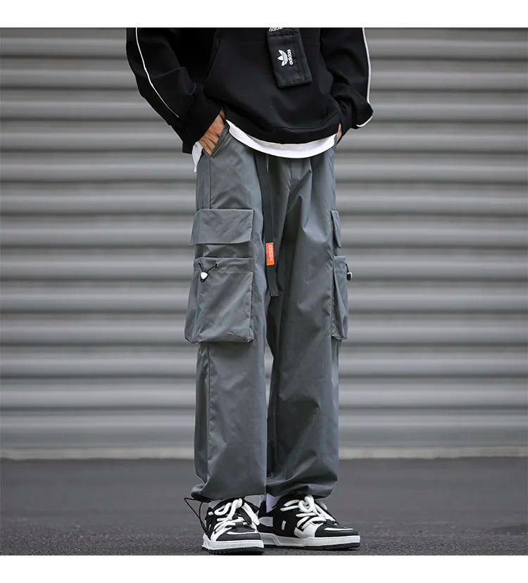 UETEEY Oversize Streetwear Drawstring Leggings Parachute Men Cargo Pants Loose Big Pocket Military Tactical Male Casual Trouser