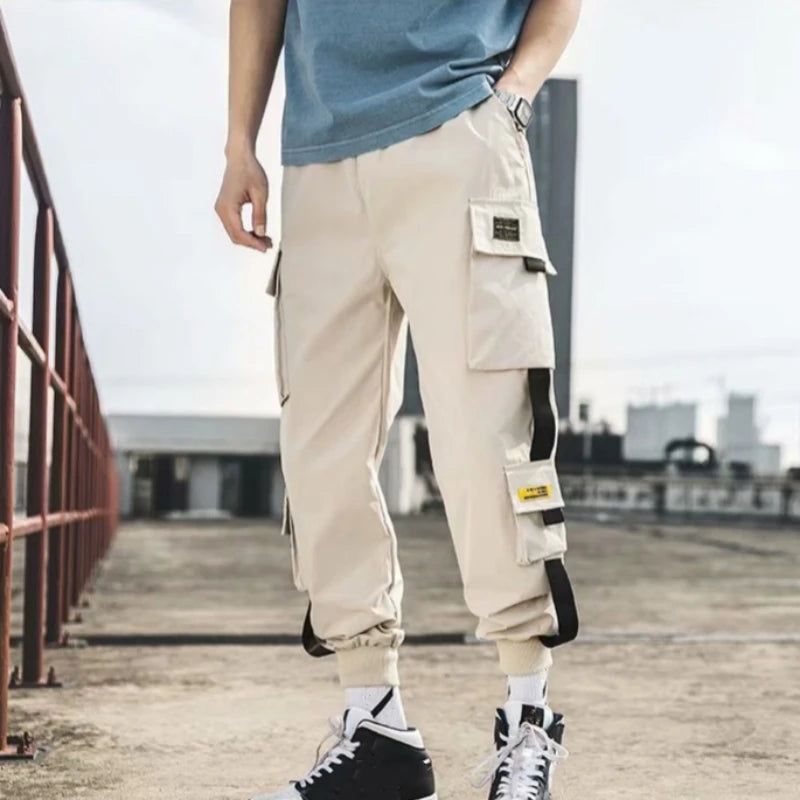 Pantalones cargo de estilo hip hop para hombre, pantalón harén, con múltiples bolsillos y cintas, ropa de calle, informal, tallas M a 6XL