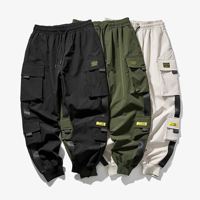 Pantalones cargo de estilo hip hop para hombre, pantalón harén, con múltiples bolsillos y cintas, ropa de calle, informal, tallas M a 6XL