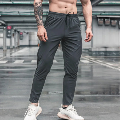 Pantalones deportivos para hombre con bolsillos, pantalones de entrenamiento para correr, pantalones deportivos de secado rápido, pantalones deportivos de alta calidad