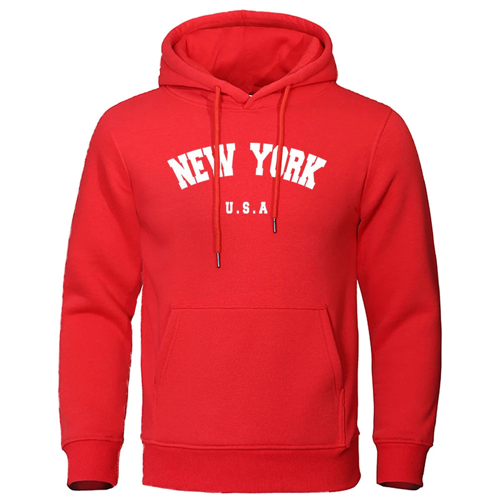 Sudadera con capucha holgada de manga larga con estampado de ciudad de Nueva York y letras de EE. UU. para hombre