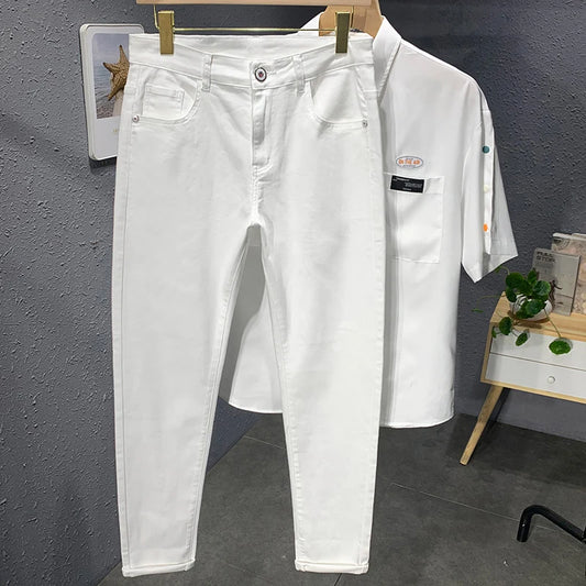 Pantalones vaqueros blancos y negros nuevos de otoño 2023 para hombre, pantalones vaqueros rectos ajustados, casuales, de algodón elástico a la moda, pantalones vaqueros de calle para hombre