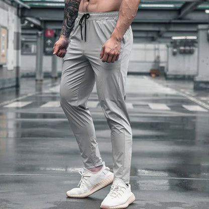 Pantalones deportivos para hombre con bolsillos, pantalones de entrenamiento para correr, pantalones deportivos de secado rápido, pantalones deportivos de alta calidad