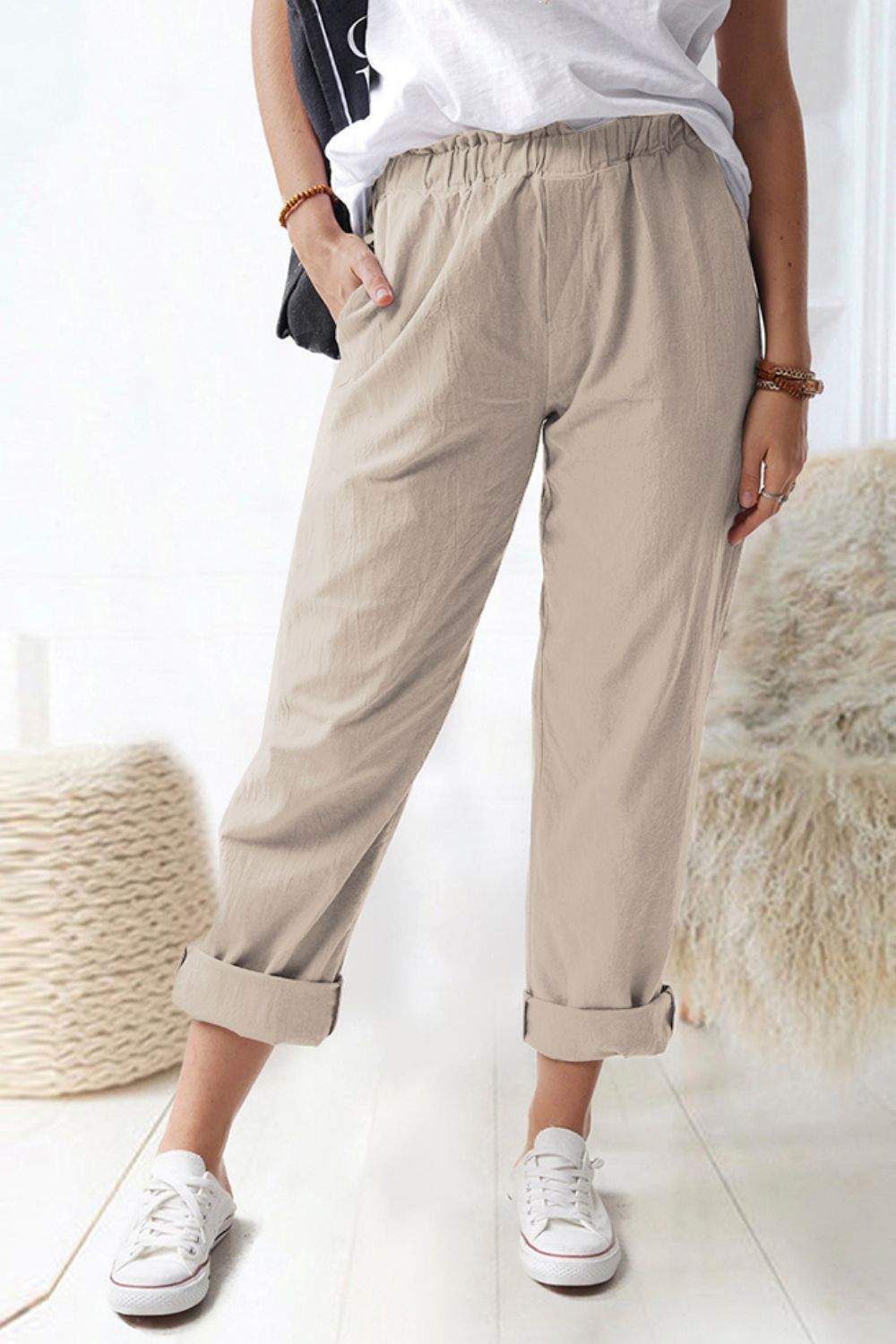 Pantalones con cintura paperbag brillante y bolsillos